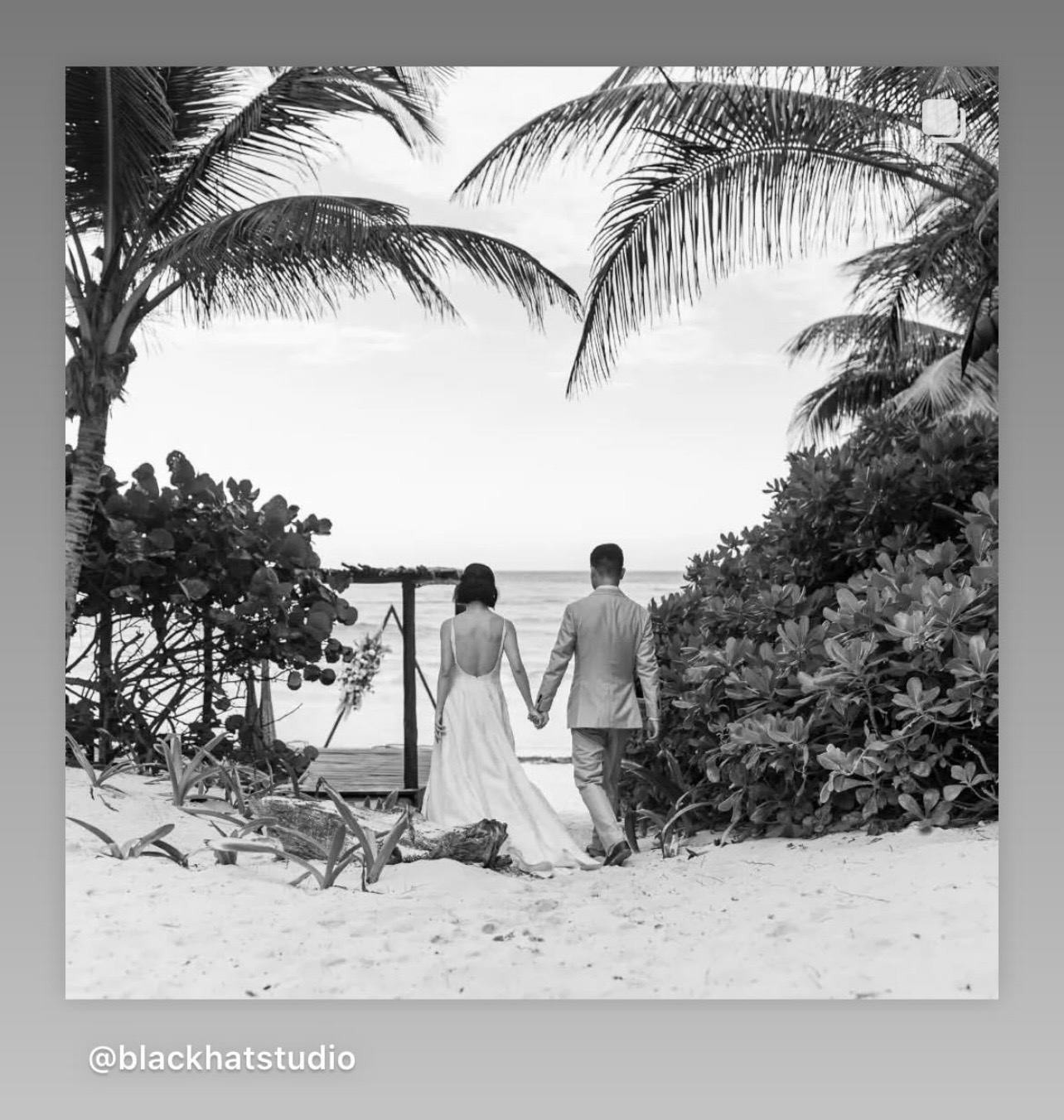 Couple on the villa's spiral staircase, Casa Carolina Tulum
